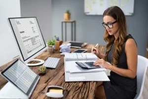 Woman handling her clients real estate accounting