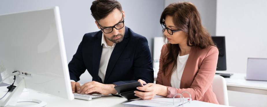 Tax accountant and client meeting over their account